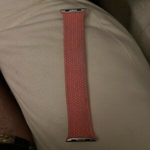 Apple size 42. Braided band stretches but hold shape well.